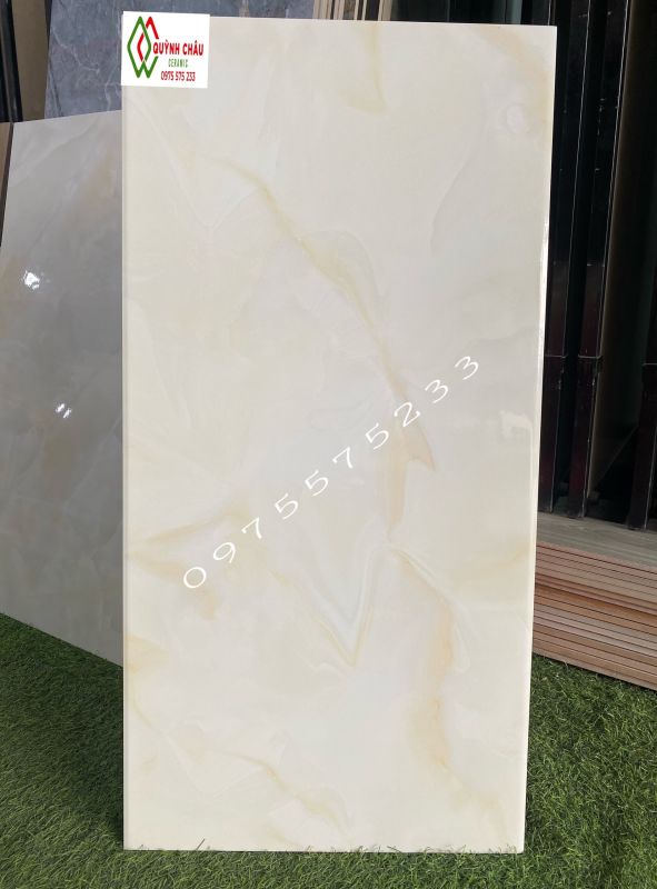 Gạch ốp tường 40x80 vân vàng men bóng TQ