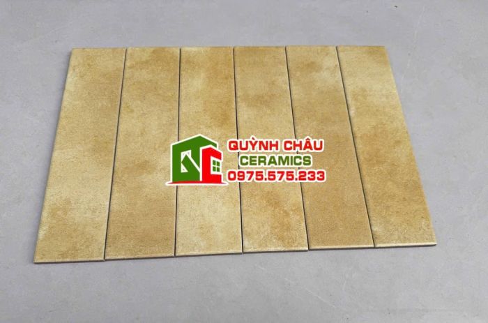 Gạch thẻ giả cổ màu vàng 75x300 đá mờ