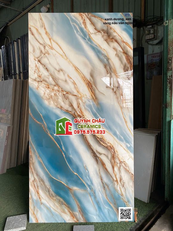 Mẫu gạch ốp lát 80x160 vân đối xứng xanh dương xen vàng ngọc đẹp