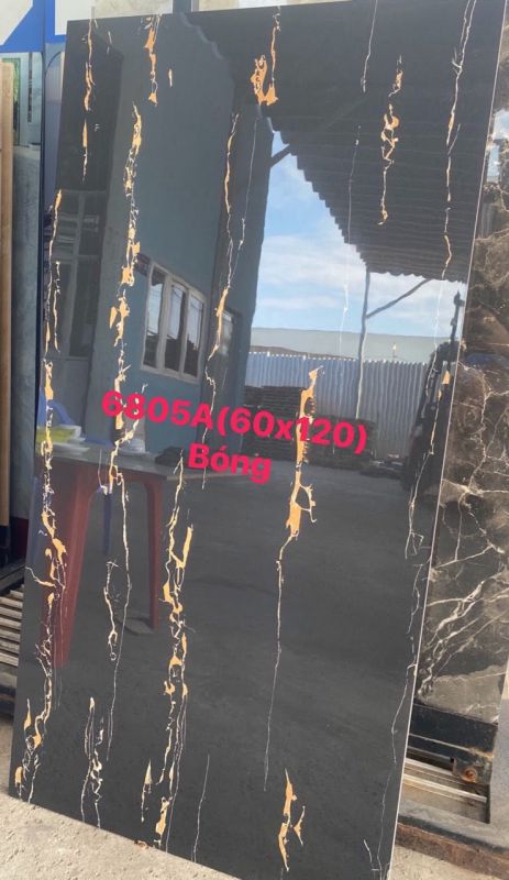 Gạch ốp lát bóng kiếng 60x120 siêu bóng đen vân vàng giá rẻ