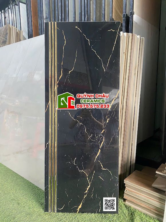 Gạch lát tam cấp cầu thang 47x120 đen vân nhũ vàng
