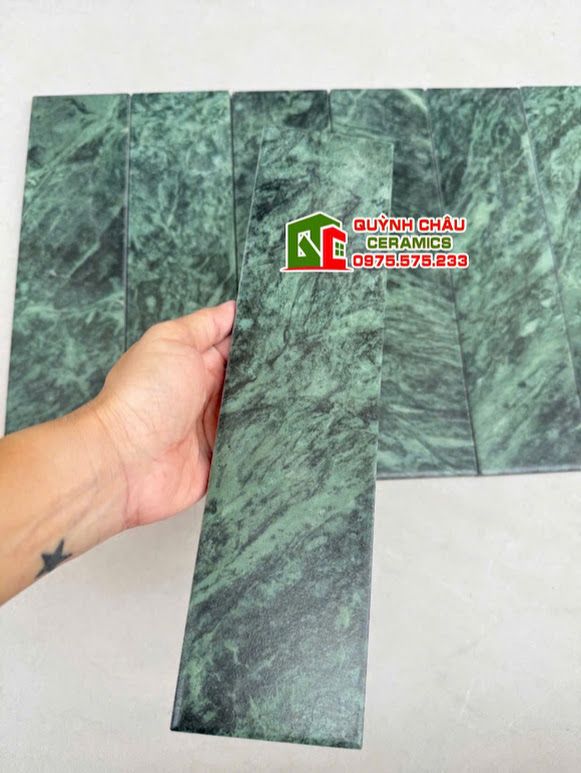 Gạch thẻ xanh vân đá mờ 75x300 ốp tường