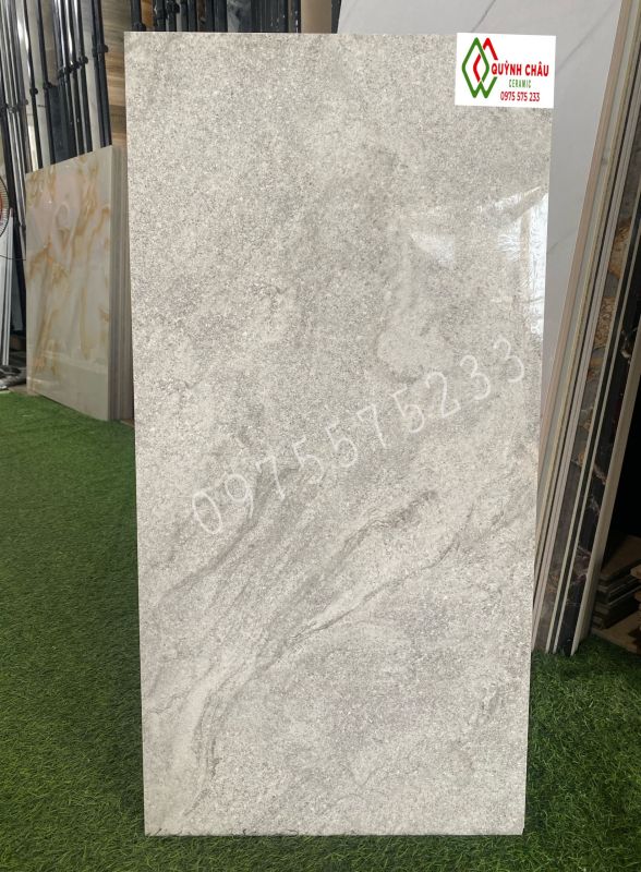 Đá ốp tường 40x80 màu xám vân đá bóng kiếng đồng chất trung quốc