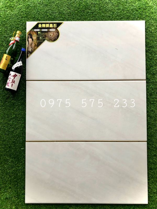 Gạch ốp tường 40x80 trắng vân khói trung quốc tân kiên bình chánh