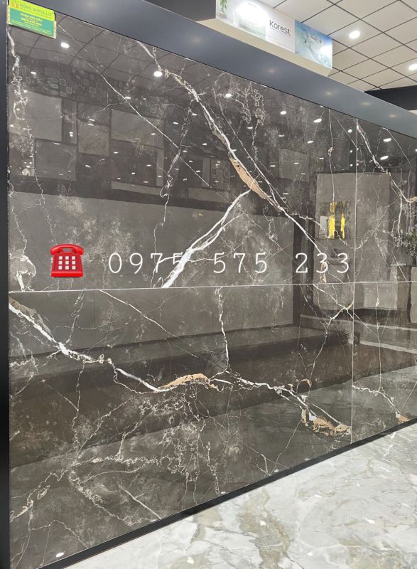 Mẫu gạch ốp mặt tiền nâu đen vân trắng 600x1200 lát nền bóng kiếng cao cấp