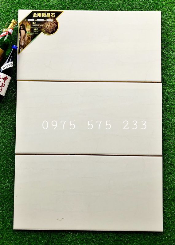 Gạch dán tường 40x80 bóng kiếng cao cấp tại tphcm bình chánh