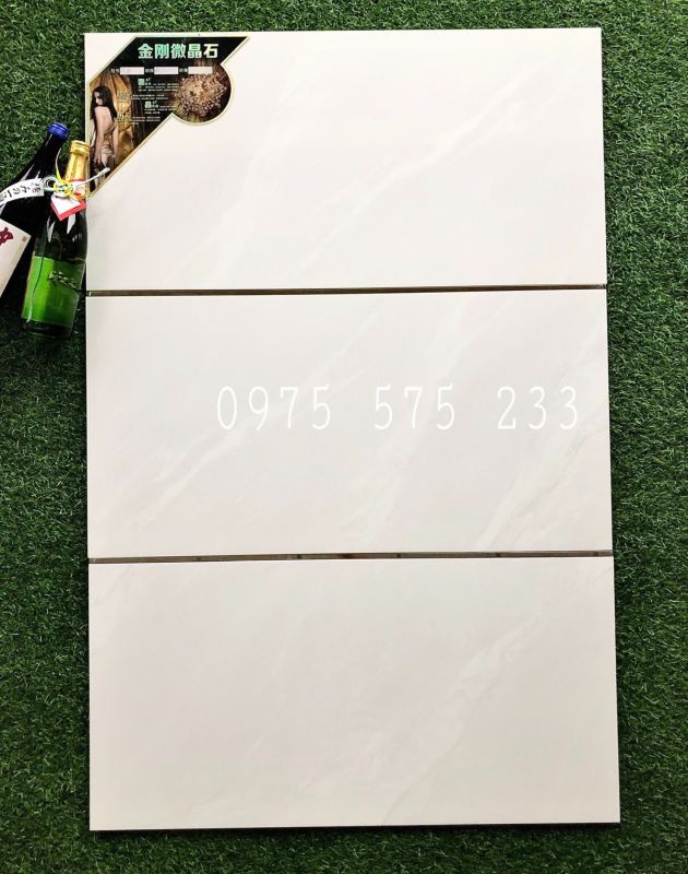 Gạch ốp tường 40x80 xám trắng vân phòng khách đẹp