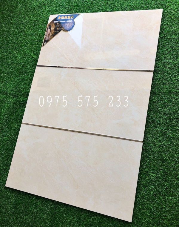 Gạch màu kem siêu bóng 40x80 ốp tường phòng khách đẹp cao cấp