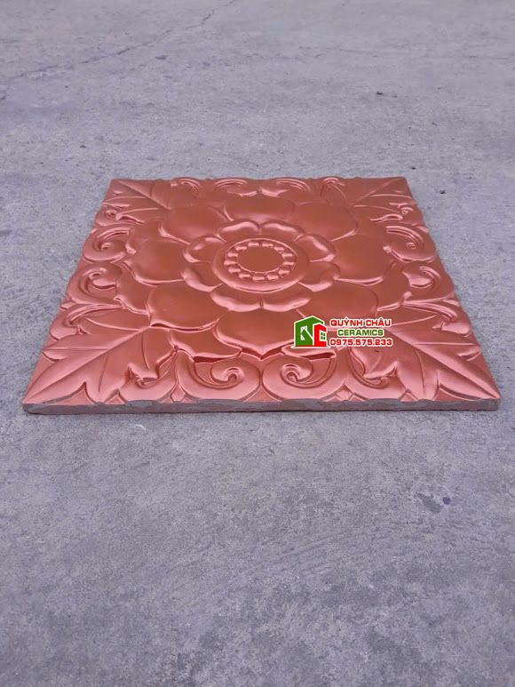 Gạch bê tông hoa văn bông hồng vàng cam 40x40 trang trí