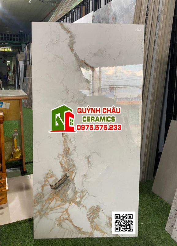 Gạch ốp lát ấn độ 60x120 bề mặt vàng vân đá đẹp Cloudy Gold Glossy