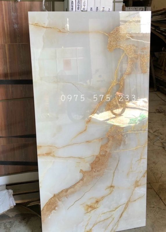 Gạch trung quôc 60x120 vân vàng ánh kim đẹp cao cấp