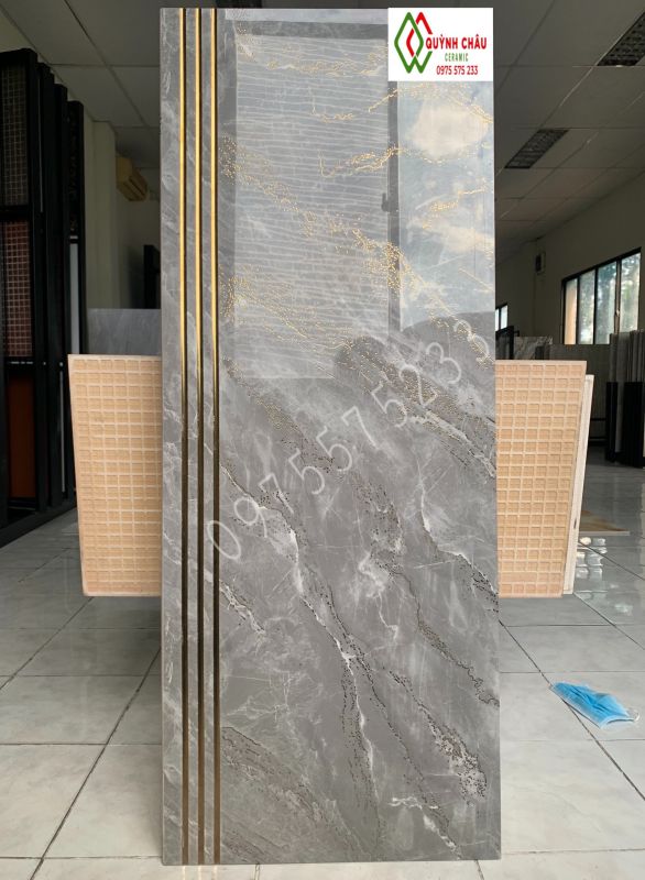 Đá lát cầu thang 47x120 đồng chất khắc kim nhũ vàng