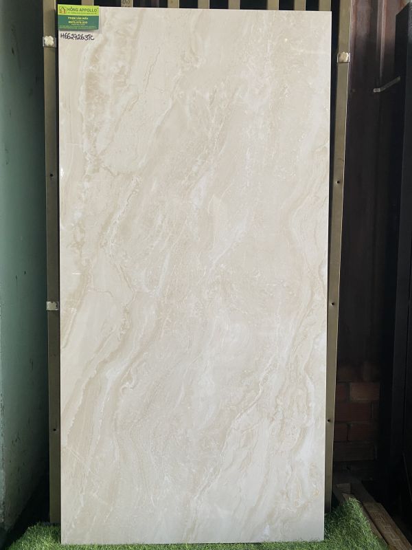 Gạch bóng kiếng 60x120 vân kem ốp lát phòng khách đẹp