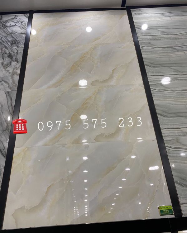 Gạch ốp lát 60x120 vân mây kem vàng bóng kiếng đẹp tại thành phố phú quốc