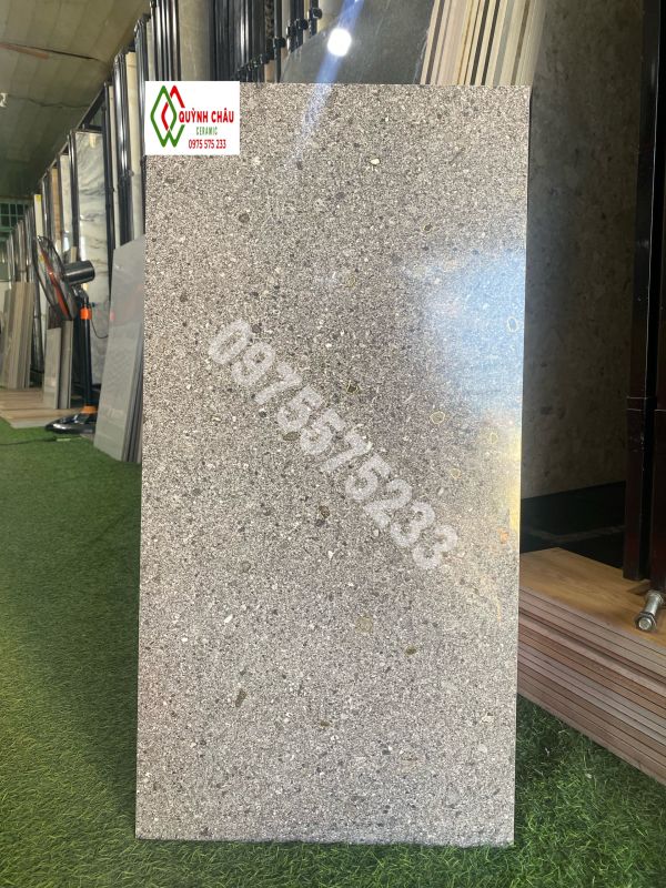Đá dán ốp tường 40x80 vân hoa cương khắc kim vàng trung quốc cao cấp