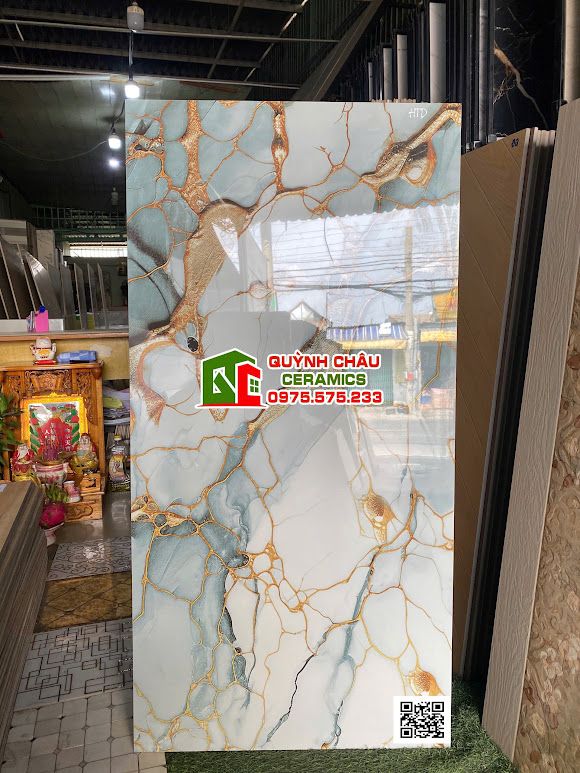 Gạch 60x120 màu nhũ vàng vân xanh đẹp siêu bóng