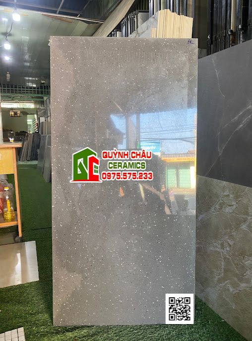 Gạch ấn độ 60x120 màu xám đen kim sa hạt đá trắng bóng kiếng
