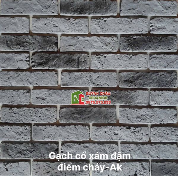 Gạch bê tông giả cổ xám đậm điểm cháy