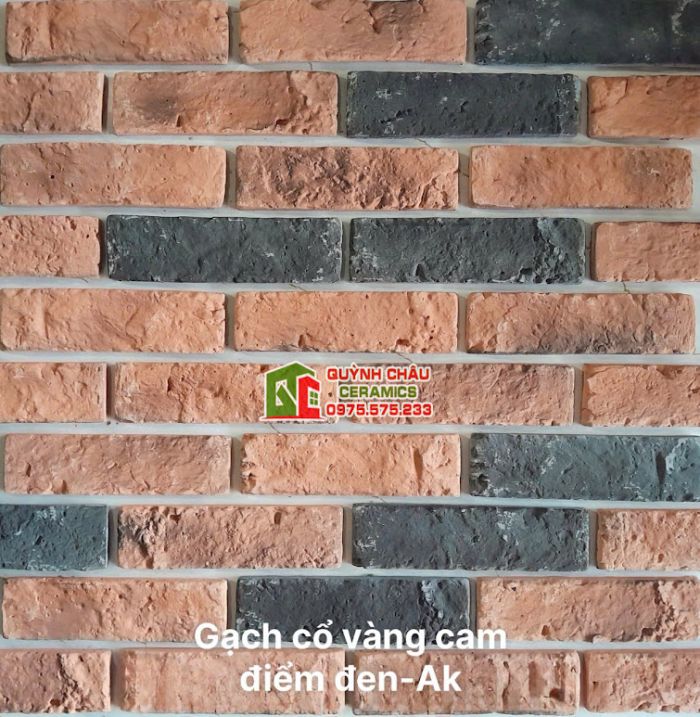 Gạch bê tông màu giả cổ vàng cam điểm đen