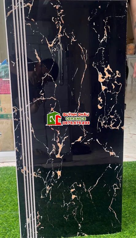 Gạch cầu thang tam cấp 47x100 đen vân cam