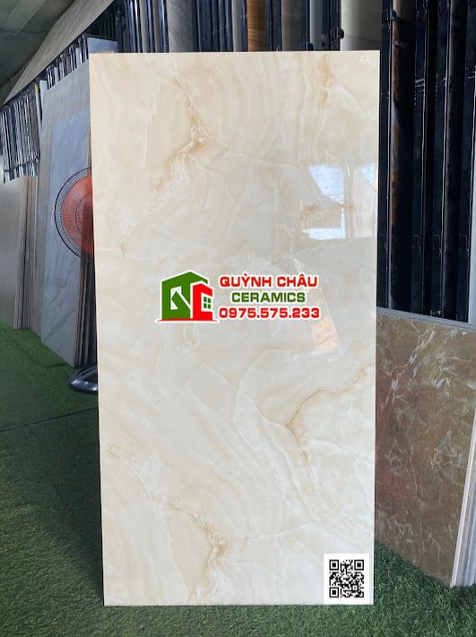 Gạch ốp lát 60x120 màu kem pha hồng vân đá onyx crema bóng kiếng