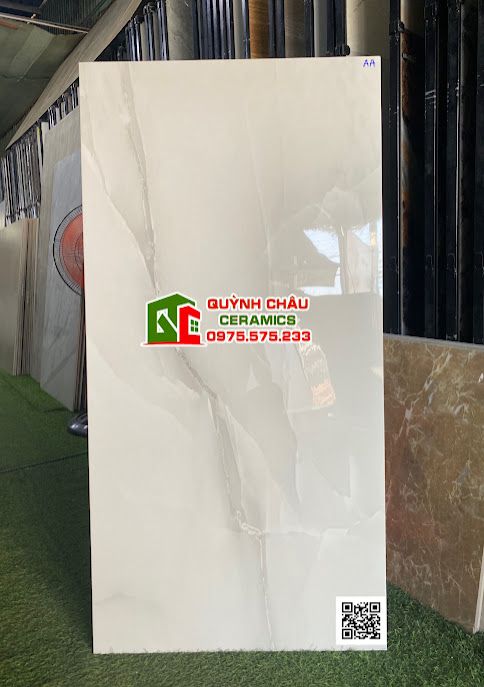 Gạch ốp lát 60x120 màu trắng xanh lợt vân đá Laimar bóng kiếng