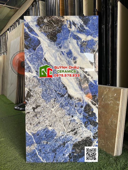 Gạch ốp lát 60x120 vân đá màu xanh saphia xen trắng bóng kiếng