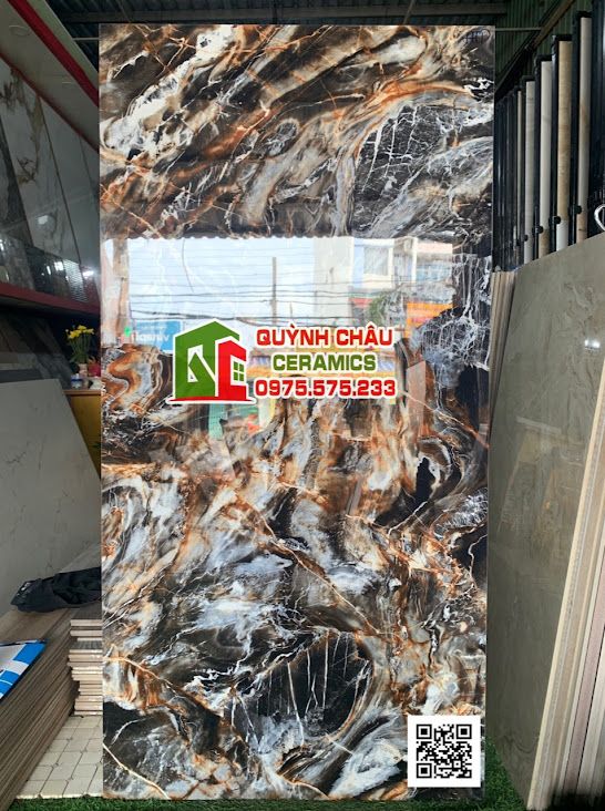 Gạch ốp lát ấn độ 80x160 vân đá mắt hổ đen xen vàng siêu bóng