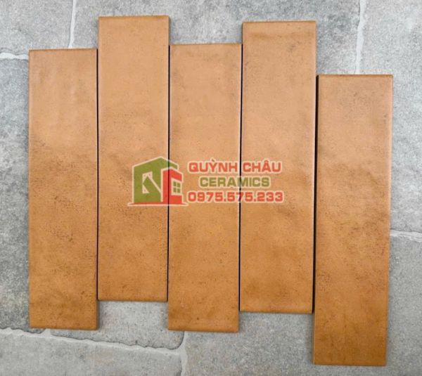 Gạch thẻ 75x300 mờ gợn sóng màu cam đậm