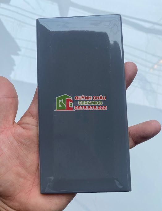 Gạch thẻ xám vát cạnh 75x150 bóng