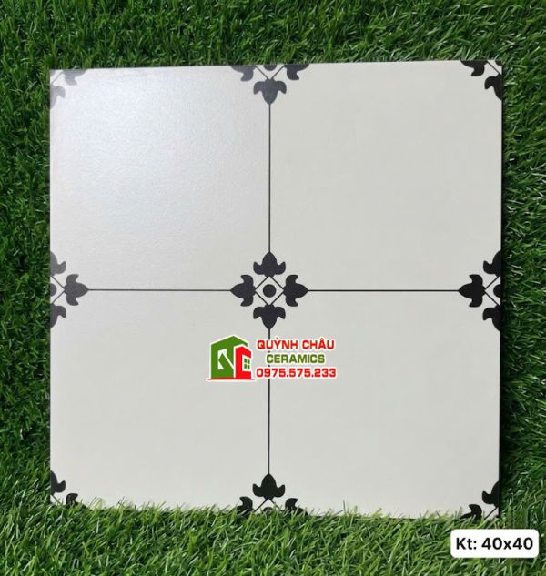 Mẫu gạch bông hoa văn đen đối xứng nền trắng 40x40cm
