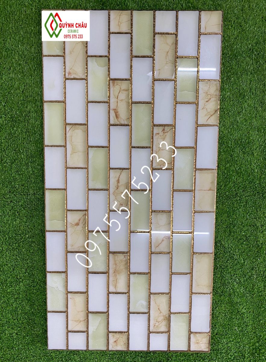 Gạch trang trí 30x60 đá khắc mạ nhũ vàng đẹp