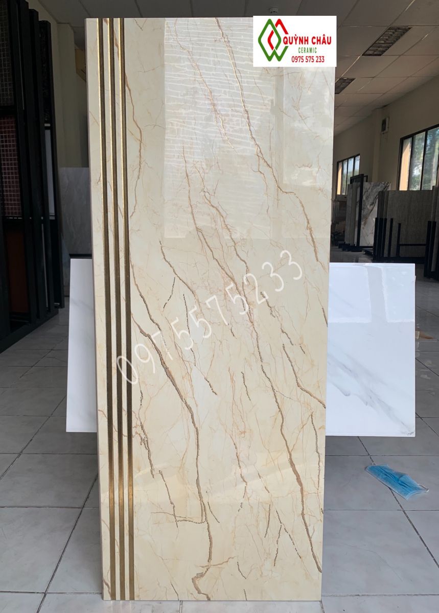 Mua gạch lát cầu thang 47x120 khắc kim nhũ vàng