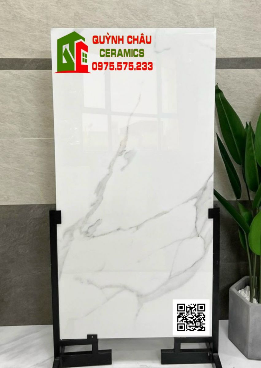 Đá lót sàn 600x1200 trắng vân khói bóng kính
