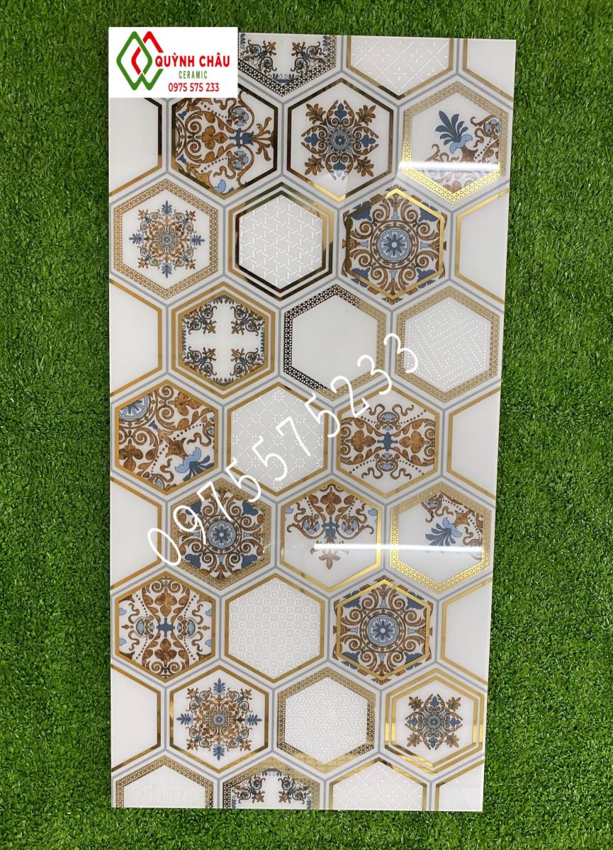 Gạch ốp tường 30x60 lục giác khắc kim bóng kính